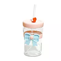 Tumblers With Bow-Shaped Silicone Sleeves and Lids.