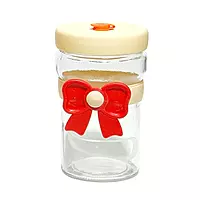 Tumblers With Bow-Shaped Silicone Sleeves and Lids.