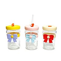 Tumblers With Bow-Shaped Silicone Sleeves and Lids.